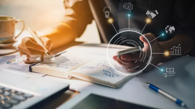 businessman-analyzing-company-financial-report-with-augmented-reality-graphics-1024x576